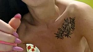 Raven-haired petite woman uses toys in the kitchen