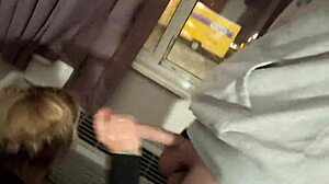 Holy crap, giving a blowjob in the hotel window while everyone watches! Is this insane or what?
