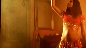 Exotic oriental woman performs belly dance
