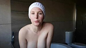 the cute brunette next door sits on the porch, lighting up a cigarette in the evening sun