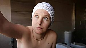 the cute brunette next door sits on the porch, lighting up a cigarette in the evening sun