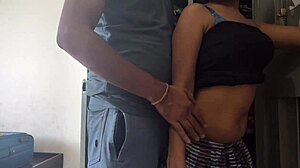 desi maid cleans cupboard with owner