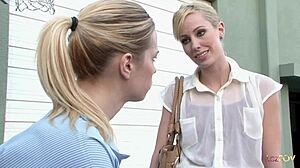 A Stunning Lesbian Blonde Comforts Another Sex Depraved Stunner in the Parking Lot