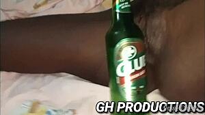 Ebony Slut Inserts Club Bottle In Pussy And Ass For Anal Play