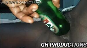 Ebony Slut Inserts Club Bottle In Pussy And Ass For Anal Play