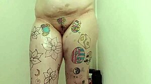 Soapy milf gets soaking wet with dripping natural tits