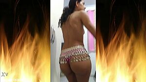 Brazilian odalisque posing in fishnets.