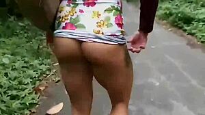 Latina pornstar flashes big clit in nature walk