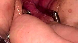 Fist Queen Gets Pussy Stretched With Metal Ring