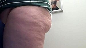 Big ass in white panties tries on tight leggings in fitting room