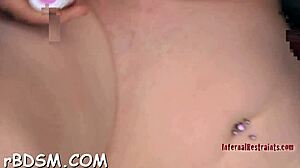 Chained chick endures intense bdsm punishment