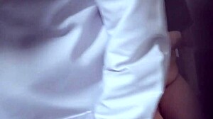 Indian doctor examines lady patient in hospital.