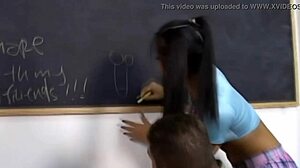 two brunettes moan while blowing one cock together