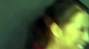 two brunettes moan while blowing one cock together