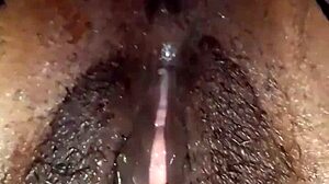 Dirty slutty maid in thong and lingerie peeing indoors with her hairy pussy exposed