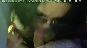 Wife in lingerie gives nice blowjob with tattoo. Husband enjoys the casual moment.