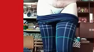 Michelle Transvestite Models In Lace Skirt Lingerie, Posing For Photos That Highlight Her Ass And Shemale Features