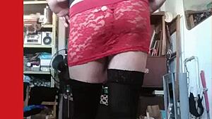 Michelle Transvestite Models In Lace Skirt Lingerie, Posing For Photos That Highlight Her Ass And Shemale Features