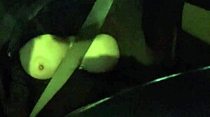 Italian milf Artemisia Love flashes her big horny boobs while driving the car outdoors.