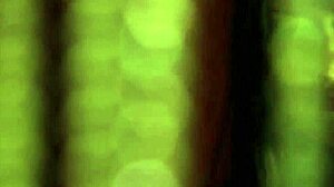 brunette milf teases in black dress solo