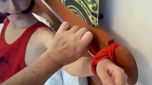 sofi bondage red ropes on bed pov, choking?