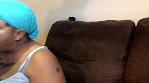 Enjoying a smoked sausage at a casual gathering.