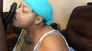 Enjoying a smoked sausage at a casual gathering.