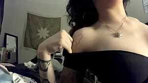 Hey, this hot girl is showing off her big tits and horny vibes