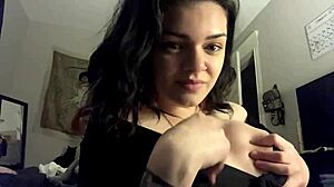 Hey, this hot girl is showing off her big tits and horny vibes