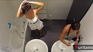 Two Cam Girls Engage In Soft Voyeuristic Action In The Bathroom