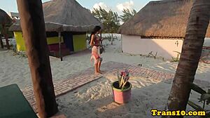 glamorous tranny poses in bikini during shower masturbation with tattoos