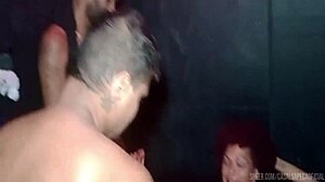 married woman feels overwhelming emotions in glory hole cabin with two well-endowed men