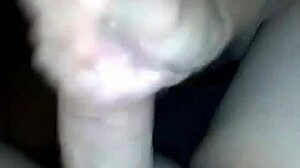 Wife gives handjob watching porn