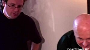 Interracial swinging where the wife enjoys big black cock handjobs