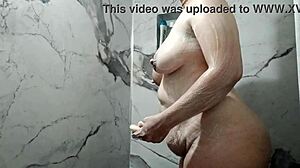 amateur homemade video showing off her big tits in detail