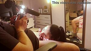 Behind the scenes, stunning brunette teen Black Lynn gives a huge blowjob with handjob and swallows mouthful