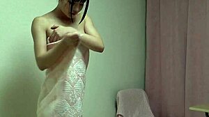 japanese girl removes lingerie and bathes in shower