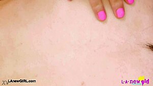 Sweet brunette babe displays her attractive body.