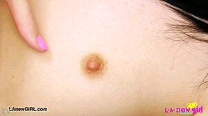 Sweet brunette babe displays her attractive body.