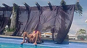 Latina cousin without swimsuit at the pool