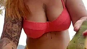 Woman makes excuse to flash big pussy on beach
