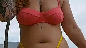 Woman makes excuse to flash big pussy on beach