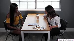 Ebony lesbian licking a busty milf's pussy on TheLesbianFactor.