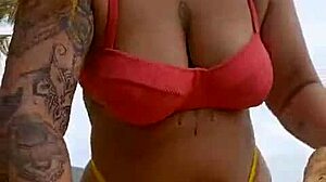 Woman makes excuse to flash big pussy on beach