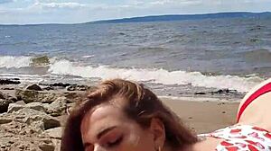 Intense blowjob by brunette couple on river.