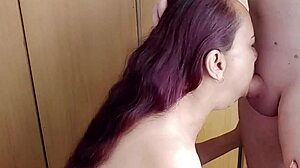 The cum slut housewife in a group cuckold setting deepthroats and swallows cum while choking on big natural tits