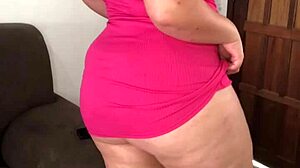 Young girl masturbates on sofa.