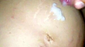 big pregnant belly covered in cum