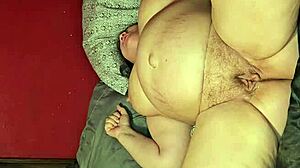 milf spreads her big ass and cums hard on the bed