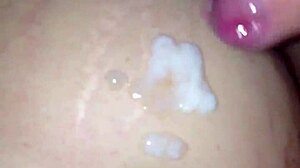 big pregnant belly covered in cum